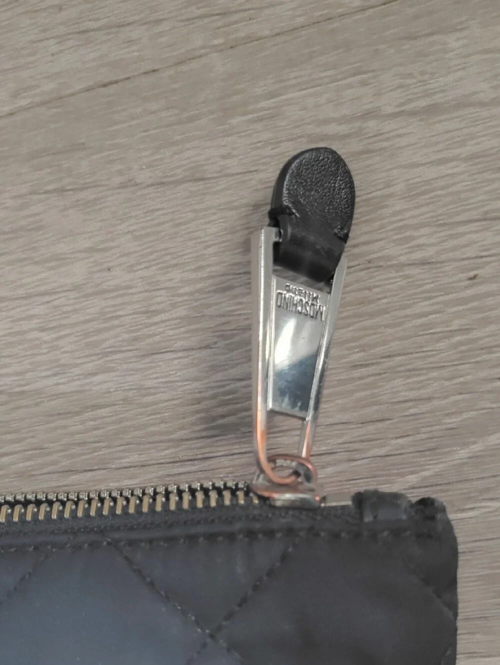 Moschino Black Quilted Logo Wristlet with Silver Accents